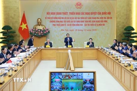 Thủ tướng Phạm Minh Chính chủ trì hội nghị triển khai Nghị quyết của Quốc hội về tháo gỡ khó khăn các dự án và phát triển kinh tế-xã hội vùng đồng bào dân tộc. (Ảnh: Dương Giang/TTXVN)
