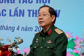 Ông Nguyễn Hữu Chính, Chủ tịch Hội Nạn nhân chất độc da cam/dioxin Việt Nam phát biểu tại hội nghị. (Ảnh: Thanh Hải/TTXVN)