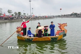 Hát quan họ trên thuyền là nét đẹp văn hóa tại hội Lim, Bắc Ninh. (Ảnh: Thanh Thương/TTXVN)