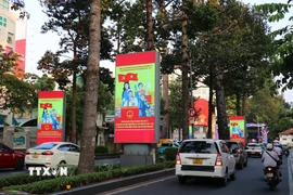 Đường Nam Kỳ Khởi Nghĩa, TP. Hồ Chí Minh rợp cờ hoa, sẵn sàng cho Ngày hội toàn dân. (Ảnh: Thanh Vũ/TTXVN)