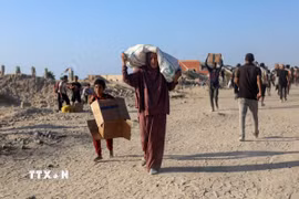 Người dân ở Gaza. (Ảnh: THX/TTXVN)