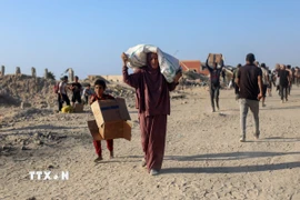 Người dân Palestine ở thành phố Gaza. (Ảnh: THX/TTXVN)