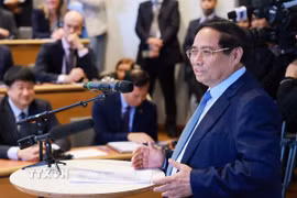 Thủ tướng Phạm Minh Chính phát biểu về chính sách của Việt Nam tại Đại học Kinh tế Stockholm. (Ảnh: Dương Giang/TTXVN)