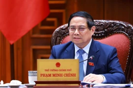 Thủ tướng Phạm Minh Chính chủ trì cuộc họp với các bộ, ngành để chuẩn bị đàm phán thương mại với Hoa Kỳ. (Ảnh: Dương Giang/TTXVN)