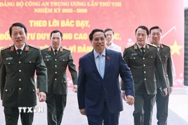 Thủ tướng Phạm Minh Chính đến dự Hội nghị Sơ kết 01 năm triển khai lực lượng tham gia bảo vệ an ninh, trật tự ở cơ sở. (Ảnh: Dương GiangTTXVN)