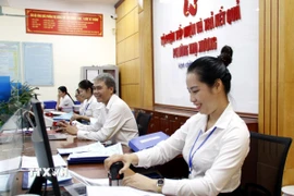 Bộ phận một cửa UBND phường Thọ Xương, thành phố Bắc Giang. (Ảnh: Đồng Thúy/TTXVN)