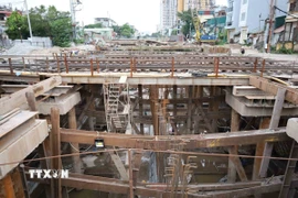 Thi công hầm chui Giải Phóng-Kim Đồng. (Ảnh: Vũ Quang/TTXVN)