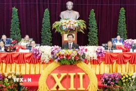 Tổng Bí thư Đảng Nhân dân Cách mạng Lào Thongloun Sisoulith phát biểu khai mạc Đại hội đại biểu toàn quốc lần thứ XII của Đảng Nhân dân Cách mạng Lào. (Ảnh: TTXVN phát)