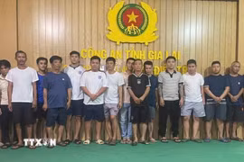 Các đối tượng tại Cơ quan Công an. (Ảnh: TTXVN phát)