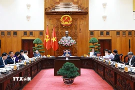 Thủ tướng Phạm Minh Chính chủ trì họp Thường trực Chính phủ về các dự án đường sắt. (Ảnh: Dương Giang/TTXVN)