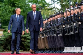 Thủ tướng Đức Friedrich Merz và người đồng cấp Ba Lan Donald Tusk. (Ảnh: Getty Images)