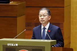 Chánh án Tòa án nhân dân tối cao Nguyễn Văn Quảng trình bày Báo cáo công tác của tòa án nhân dân năm 2025. (Ảnh: Doãn Tấn/TTXVN)