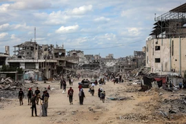 Người dân Palestine tại Dải Gaza. (Ảnh: THX/TTXVN)