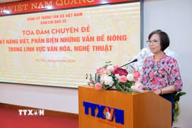 Đồng chí Vũ Việt Trang, Ủy viên Ban Thường vụ Đảng ủy các cơ quan Đảng Trung ương, Phó Trưởng Ban Tuyên giáo và Dân vận Trung ương, Bí thư Đảng ủy, Tổng Giám đốc Thông tấn xã Việt Nam phát biểu khai mạc buổi Tọa đàm. (Ảnh: Lê Đông/TTXVN)
