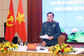 Thượng tướng Hoàng Xuân Chiến, Ủy viên Trung ương Đảng, Thứ trưởng Bộ Quốc phòng, Trưởng Cơ quan Thường trực Ban Chỉ đạo Quốc gia 701 phát biểu chỉ đạo hội nghị. (Ảnh: Phạm Kiên/TTXVN)
