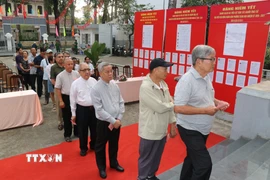 Đông đảo cử tri nô nức tham gia bỏ phiếu tại khu vực bỏ phiếu số 1, phường Xuân Hòa, Thành phố Hồ Chí Minh. (Ảnh: Thanh Vũ/TTXVN)