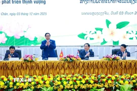 Thủ tướng Phạm Minh Chính tham dự Hội nghị xúc tiến đầu tư Việt Nam-Lào năm 2025. (Ảnh: Dương Giang/TTXVN)