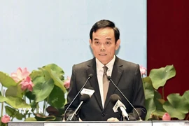 Ông Trần Lưu Quang, Bí thư Trung ương Đảng, Bí thư Thành ủy Thành phố Hồ Chí Minh phát biểu chỉ đạo Đại hội đại biểu Mặt trận Tổ quốc Việt Nam Thành phố Hồ Chí Minh. (Ảnh: Xuân Khu/TTXVN)