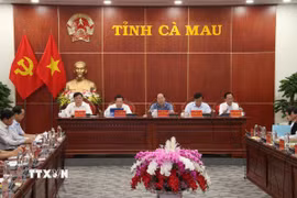 Lãnh đạo hai tỉnh Cà Mau và Bạc Liêu dự Hội nghị. (Ảnh: Kim Há/TTXVN)