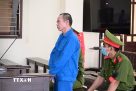 Bị cáo Nguyễn Văn Quang tại phiên tòa. (Ảnh: TTXVN phát)