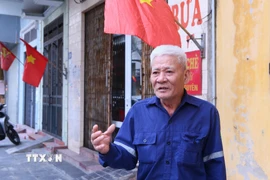 Ông Trần Văn An, Tổ trưởng Tổ dân phố Vị Hoàng 1, phường Nam Định, luôn dành trọn niềm tin tuyệt đối vào sự lãnh đạo của Đảng. (Ảnh: Công Luật/TTXVN)