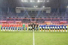 Đội bóng tỉnh Quảng Ninh và đội bóng Khu tự trị dân tộc Choang Quảng Tây đấu chung kết. (Ảnh: Công Tuyên/TTXVN)