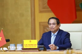 Thủ tướng Phạm Minh Chính phát biểu tại Hội nghị cấp cao trực tuyến về khí hậu. (Ảnh: Dương Giang/TTXVN)