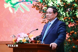 Thủ tướng Phạm Minh Chính đến thăm, chúc mừng năm mới và làm việc với Bộ Văn hóa, Thể thao và Du lịch. (Ảnh: Dương Giang/TTXVN)