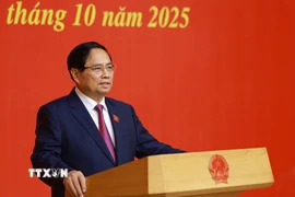 Thủ tướng Phạm Minh Chính giao nhiệm vụ cho Phó Thủ tướng Chính phủ, Bộ trưởng nhiệm kỳ 2021-2026. (Ảnh: Dương Giang/TTXVN)