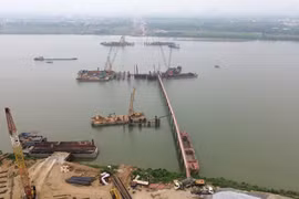 Cầu Ngọc Hồi có điểm đầu được kết nối với đường Vành đai 3,5 đoạn Phúc La-Văn Phú đến cao tốc Pháp Vân-Cầu Giẽ cách cao tốc khoảng 360m về phía đê Hữu Hồng thuộc địa bàn xã Thanh Trì, Hà Nội. Điểm cuối Km7+500 kết nối với đường Vành đai 3,5 cách đê Tả Hồng khoảng 700m về phía cao tốc Hà Nội-Hải Phòng thuộc địa bàn xã Văn Giang, tỉnh Hưng Yên. (Ảnh: Quốc Khánh/TTXVN)