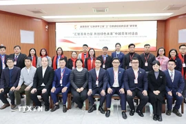 Đại biểu thanh niên các tỉnh biên giới Việt-Trung tham dự diễn đàn. (Ảnh: Công Tuyên/TTXVN)