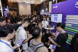 Gian hàng Vinamilk thu hút sự quan tâm của nhiều khách tham dự tại sự kiện AWS Cloud Day Việt Nam 2025. (Ảnh: AWS)