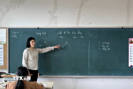 Học sinh Trường Trung học phổ thông Trưng Vương. (Ảnh: Hồng Giang/TTXVN)