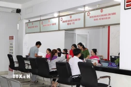 Trung tâm hành chính công của phường Dĩ An phục vụ người dân ở Đường số 10, phường Dĩ An, Thành phố Hồ Chí Minh. (Ảnh: Huyền Trang/TTXVN)