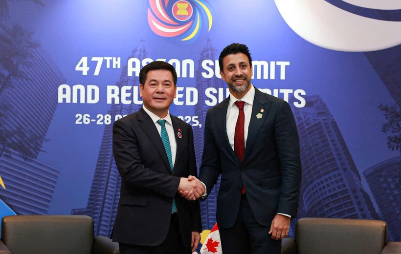 Bộ trưởng Bộ Công Thương Nguyễn Hồng Diên và Bộ trưởng Thương mại quốc tế Canada Maninder Sidhu. (Ảnh: Bộ Công Thương)