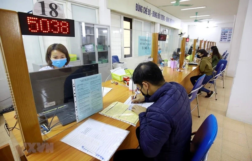 Hướng dẫn cách xác định đối tượng được trợ cấp, nghỉ hưu sớm theo Nghị định 178 Cán bộ, công chức dự kiến bố trí làm việc tại các xã mới đều là đối tượng chịu sự tác động trực tiếp của việc thực hiện sắp xếp tổ chức bộ máy và thuộc đối tượng áp dụng theo Nghị định số 178/2024/NĐ-CP. (Ảnh: PV/Vietnam+)