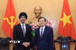 Ông Đoàn Minh Huấn, Ủy viên Bộ Chính trị, Giám đốc Học viện Chính trị Quốc gia Hồ Chí Minh tiếp ông Rajpal Singh, Đại sứ Singapore tại Việt Nam. (Ảnh: Tuấn Anh/TTXVN)