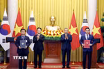 Tổng Bí thư, Chủ tịch nước Tô Lâm và Tổng thống Hàn Quốc Lee Jae Myung chứng kiến lễ trao Bản ghi nhớ về hợp tác trong lĩnh vực hạ tầng điện lực giữa Bộ Công Thương Việt Nam và Bộ Khí hậu, Năng lượng và Môi trường Hàn Quốc. (Ảnh: Thống Nhất/TTXVN)