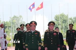 Chủ nhiệm Tổng cục Chính trị QĐND Việt Nam Trịnh Văn Quyết và Chủ nhiệm Tổng cục Chính trị QĐND Lào Vongsone Inpanphim. (Ảnh: Trọng Đức/TTXVN)
