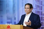 Thủ tướng Phạm Minh Chính chủ trì hội nghị thúc đẩy phát triển nhà ở xã hội. (Ảnh: Dương Giang/TTXVN)