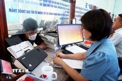 Cán bộ, công chức, viên chức trong năm trước liền kề hoặc năm xét tinh giản biên chế bị xếp loại không hoàn thành nhiệm vụ sẽ bị tinh giản biên chế. (Ảnh minh hoạ: Hồng Đạt/TTXVN)