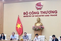 Bộ Công Thương tổ chức Hội nghị tham vấn chính sách Dự án Luật Giao dịch hàng hóa phái sinh. (Ảnh: PV/Vietnam+)