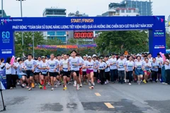 Lễ phát động và Giải chạy hưởng ứng "Toàn dân sử dụng năng lượng tiết kiệm hiệu quả và hưởng ứng Chiến dịch Giờ Trái đất năm 2026." (Ảnh: BCT/Vietnam+)