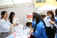 20 doanh nghiệp đã trực tiếp có mặt tại trụ sở Học viện Phụ nữ Việt Nam để phỏng vấn và tuyển dụng các bạn sinh viên. (Ảnh: Hồng Nhung/Vietnam+)