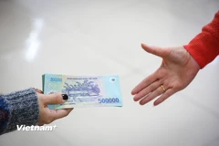 Đối với số kinh phí công đoàn và đoàn phí công đoàn (kết dư, mới đóng) còn lại ở công đoàn cơ sở thì Ban Chấp hành công đoàn cơ sở được quyền chi cho các hoạt động chăm lo, hỗ trợ đoàn viên, người lao động. (Ảnh: PV/Vietnam+)