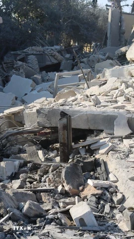 Các tòa nhà của Liban bị phá hủy sau cuộc không kích của Israel tại Zawtar al-Sharqiya, Liban. (Ảnh: THX/TTXVN)