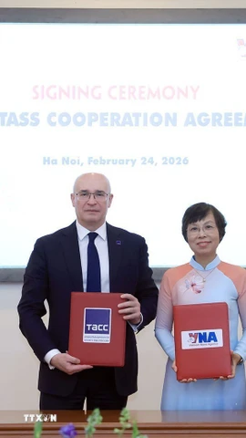 Lễ ký kết thỏa thuận hợp tác giữa TTXVN và Hãng thông tấn TASS (Liên bang Nga). (Ảnh: Tuấn Anh/TTXVN)