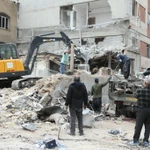 Những tòa nhà bị phá hủy sau các cuộc không kích của Israel nhằm vào thủ đô Tehran, Iran ngày 15/3/2026. (Nguồn: THX/TTXVN)