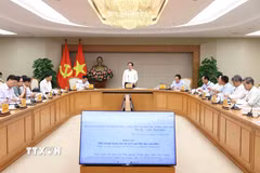 Phó Thủ tướng Hồ Quốc Dũng chủ trì họp về một số nội dung của dự án Luật Đất đai (sửa đổi). (Ảnh: An Đăng/TTXVN)