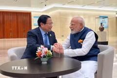 Thủ tướng Phạm Minh Chính gặp Thủ tướng Ấn Độ Narendra Modi. (Nguồn: TTXVN)
